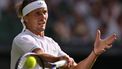 Germany's Alexander Zverev plays a forehand return to France's Arthur Rinderknech during their men's singles first round tennis match on the second day of the 2025 Wimbledon Championships at The All England Lawn Tennis and Croquet Club in Wimbledon, southwest London, on July 1, 2025. 
Glyn KIRK / AFP