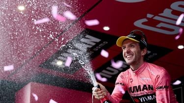 Team Visma-Lease a Bike's British rider Simon Yates celebrates on the podium after winning the pink jersey of overall leader (Maglia Rosa) in the 20th stage of the 108th Giro d'Italia cycling race 205kms from Verres to Sestriere on May 31, 2025. 
Luca Bettini / AFP