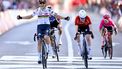 Mauritius' AG Soudal Team's Kim Le Court (L) celebrates after winning the women elite race of the Liege-Bastogne-Liege one day cycling event, 152,9km from Bastogne to Liege, on April 27, 2025. 
ERIC LALMAND / Belga / AFP