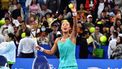 2023-10-14 15:32:03 China's Zheng Qinwen celebrates after winning the women's singles semi-final match against Italy's Jasmine Paolini at the WTA Zhengzhou Open tennis tournament in Zhengzhou, in China's central Henan province on October 14, 2023. 
AFP