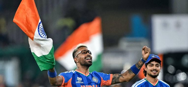 India's Hardik Pandya (L) and his teammate Ishan Kishan celebrate after their team's win in the 2026 ICC Men's T20 Cricket World Cup final match against New Zealand at the Narendra Modi Stadium in Ahmedabad on March 8, 2026. 
Punit PARANJPE / AFP