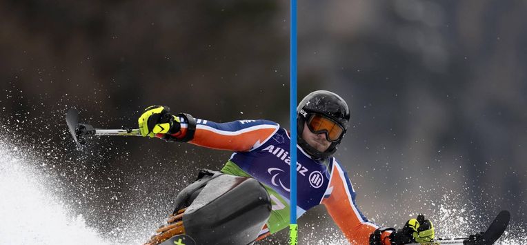 epa12809372 Netherlands' Jeroen Kampschreur in action during the Slalom run in the Men's Alpine Combined of the Para Alpine Skiing at Milano Cortina 2026 Paralympic Winter Games in Cortina d'Ampezzo, Italy, 10 March 2026.  EPA/CLAUDIO THOMA