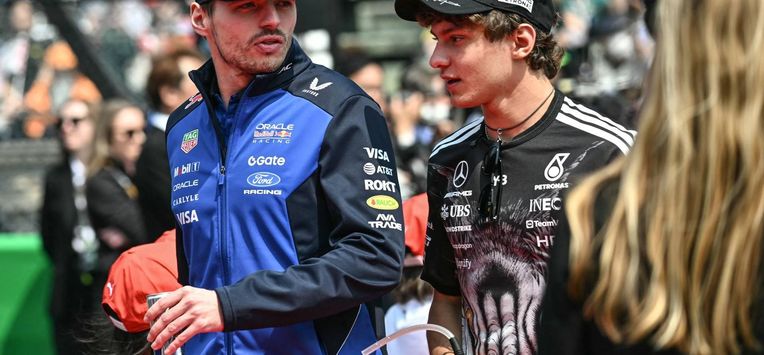 Red Bull Racing's Dutch driver Max Verstappen and Mercedes' Italian driver Kimi Antonelli arrive for the drivers' parade before the Formula One Japanese Grand Prix at the Suzuka circuit in Suzuka, Mie prefecture on March 29, 2026. 
Philip FONG / AFP