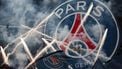 Flags and banners with the PSG logo are waved as fireworks are set off during a show prior to the French Cup final football match between Paris Saint-Germain (PSG) and Stade de Reims at the Stade de France in Saint-Denis, north of Paris, on May 24, 2025.  
FRANCK FIFE / AFP