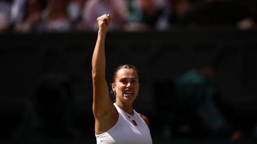 Belarus's Aryna Sabalenka celebrates after winning a point against US player Amanda Anisimova during their women's singles semi-final tennis match on the eleventh day of the 2025 Wimbledon Championships at The All England Lawn Tennis and Croquet Club in Wimbledon, southwest London, on July 10, 2025. 
HENRY NICHOLLS / AFP