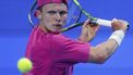 Netherlands’ Jesper De Jong hits a return against Russia's Andrey Rublev during their men’s singles match at the Qatar Open tennis tournament in Doha on February 17, 2026. 
Karim JAAFAR / AFP