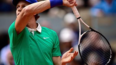 Italy's Jannik Sinner looks on after returning a ball to Kazakhstan's Alexander Bublik during their quarter-final men's singles match on day 11 of the French Open tennis tournament on Court Philippe-Chatrier at the Roland-Garros Complex in Paris on June 4, 2025. 
JULIEN DE ROSA / AFP