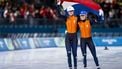 MILAAN - (l-r) Benthe Kerkhoff, Marijke Groenewoud vieren de gouden medaille van Marijke Groenewoud na het winnen van de finale van de massastart in het Milano Ice Park op de Olympische Winterspelen van Milaan en Cortina d'Ampezzo. SEM VAN DER WAL / ANP
