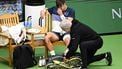 epa12462218 Holger Rune of Denmark receives medical treatment during the singles semifinal match against Ugo Humbert of France (not pictured) at the BNP Paribas Nordic Open tennis tournament in Stockholm, Sweden, 18 October 2025.  EPA/Anders Wiklund SWEDEN OUT