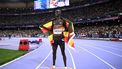 Winner Uganda's Joshua Cheptegei celebrates after crossing the finish line in the men's 10000m final of the athletics event at the Paris 2024 Olympic Games at Stade de France in Saint-Denis, north of Paris, on August 2, 2024. Uganda's Joshua Cheptegei sets a new Olympic record in the men's 10000m.
Kirill KUDRYAVTSEV / AFP