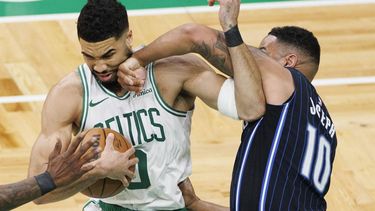 epa12043617 Boston Celtics forward Jayson Tatum (L) keeps the ball from Orlando Magic guard Cory Joseph (R) during the third quarter of the Eastern Conference First Round playoff game one between the Boston Celtics and the Orlando Magic in Boston, Massachusetts, USA, 20 April 2025.  EPA/CJ GUNTHER SHUTTERSTOCK OUT