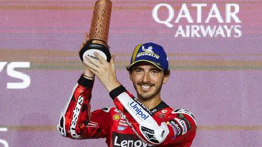 Third-placed Aprilia Racing's Spanish rider Jorge Martin celebrates on the podium at the end of the Qatar MotoGP Grand Prix at the Lusail International Circuit in Lusail, north of Doha, on April 13, 2025. 
Karim JAAFAR / AFP