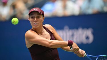 USA’s Jessica Pegula plays a backhand return against to Romania’s Elena-Gabriela Ruse during their women’s singles first-round match on the opening day of the US Open tennis tournament at the USTA Billie Jean King National Tennis Center in New York City on August 30, 2026. 
ANGELA WEISS / AFP