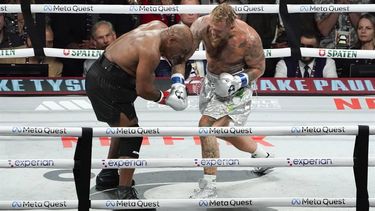 US retired pro-boxer Mike Tyson (L) and US YouTuber/boxer Jake Paul (R) fight during the heavyweight boxing bout at The Pavilion at AT&T Stadium in Arlington, Texas, November 15, 2024. 
TIMOTHY A. CLARY / AFP