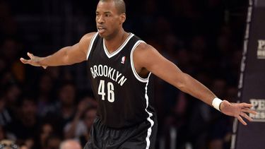 epa04098473 Brooklyn Nets Jason Collins, the first openly gay NBA player, in action during the first half of their NBA game against the Los Angeles Lakers at the Staples Center in Los Angeles, California, USA, 23 February 2014.  EPA/MICHAEL NELSON CORBIS OUT