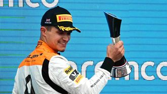 2023-07-09 16:52:14 epa10736457 Second placed British Formula One driver Lando Norris of McLaren F1 Team celebrates on the podium for the Formula 1 British Grand Prix 2023, at the Silverstone Circuit race track in Silverstone, Britain, 09 July 2023.  EPA/CHRISTIAN BRUNA