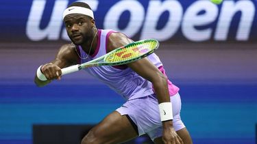 USA's Frances Tiafoe hits a return to Bulgaria's Grigor Dimitrov during their men's quarterfinals match on day nine of the US Open tennis tournament at the USTA Billie Jean King National Tennis Center in New York City, on September 3, 2024. 
CHARLY TRIBALLEAU / AFP