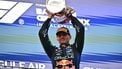 Race winner Red Bull Racing's Dutch driver Max Verstappen lifts his trophy during podium ceremony of the Formula One Bahrain Grand Prix in Sepang on October 4, 2026. 
Lillian SUWANRUMPHA / AFP