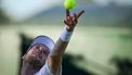 Netherlands' Botic Van De Zandschulp serves the ball to Italy's Matteo Arnaldi during their men's singles first round tennis match on the first day of the 2025 Wimbledon Championships at The All England Lawn Tennis and Croquet Club in Wimbledon, southwest London, on June 30, 2025. 
Kirill KUDRYAVTSEV / AFP