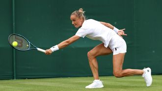 epa11449934 Arantxa Rus of the Netherlands in action during the Women's 1st round match against Yue Yuan of China at the Wimbledon Championships, Wimbledon, Britain, 01 July 2024.  EPA/TIM IRELAND  EDITORIAL USE ONLY