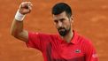 Serbia's Novak Djokovic celebrates his victory over France's Corentin Moutet during their men's singles match on day 5 of the French Open tennis tournament on Court Suzanne-Lenglen at the Roland-Garros Complex in Paris on May 29, 2025. 
Dimitar DILKOFF / AFP