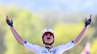 FDJ United - Suez's Dutch Demi Vollering celebrates as she crosses the finish line to win 'La Fleche Wallonne' one day cycling race, 141 km from Huy to Huy, on April 22, 2026. 
JOHN THYS / AFP