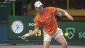 2023-09-17 14:58:16 epa10866238 Botic Van de Zandschulp of Netherlands in action against Duje Ajdukovic of Croatia during the Davis Cup Group D match between Netherlands and Croatia in Split, Croatia, 17 September 2023.  EPA/STRINGER