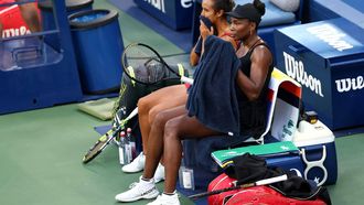 Canada’s Leylah Fernandez (L) and USA’s Venus Williams (L) are seen during a break during their women's doubles quarterfinal match against USA’s Taylor Townsend and Czech Republic’s Kateřina Siniaková at the US Open tennis tournament at the USTA Billie Jean King National Tennis Center in New York City on September 2, 2025. 
CHARLY TRIBALLEAU / AFP