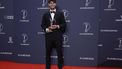 epa12903320 Spanish tennis player Carlos Alcaraz poses with the Sportsman of the Year award at the Laureus World Sports Awards Madrid 2026 in Madrid, Spain, 20 April 2026.  EPA/J.J. Guillen