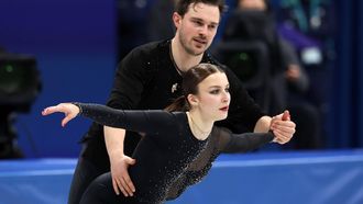 epa12744666 Daria Danilova and Michel Tsiba of Netherlands perform in the Pair Skating Short Program of the Figure Skating competitions at the Milano Cortina 2026 Winter Olympic Games, in Milan, Italy, 15 February 2026.  EPA/WU HAO