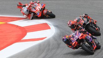 Ducati Spanish rider Jorge Martin, Aprilia Spanish rider Maverick Vinales and Ducati Italian rider Enea Bastianini compete during the MotoGP race of the Portuguese Grand Prix at the Algarve International Circuit in Portimao on March 24, 2024. 
PATRICIA DE MELO MOREIRA / AFP