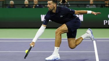 epa12813403 Novak Djokovic of Serbia in action during the men’s singles match against Jack Draper of Great Britain on day 8 of the BNP Paribas Open tennis tournament in Indian Wells, California, USA, 11 March 2026.  EPA/JOHN G. MABANGLO