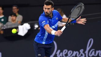 epa11799680 Novak Djokovic of Serbia in action against Rinky Hijikata of Australia during their Brisbane International tennis tournament match at Queensland Tennis Centre in Brisbane, Australia, 31 December 2024.  EPA/JONO SEARLE  AUSTRALIA AND NEW ZEALAND OUT