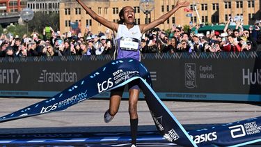 Netherlands's Sifan Hassan crosses the finish line first in the 2025 Sydney Marathon, crossing the iconic Harbour Bridge on August 31, 2025. 
Saeed KHAN / AFP