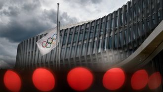 A picture taken on June 8, 2020 shows the Olympic flag flying next to the headquarters of the International Olympic Committee (IOC) in Lausanne, amid the COVID-19 crisis, caused by the novel coronavirus. The International Olympic Committee (IOC) Executive Board will meet remotely by videoconference on June 10, 2020 to report on the Tokyo 2020 and Paris 2024 Olympics.
Fabrice COFFRINI / AFP