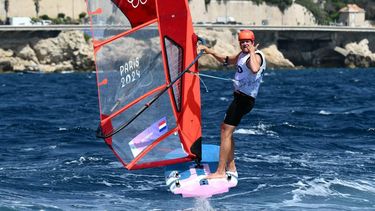 Netherlands' Luuc Van Opzeeland celebrates after winning Race 6 of the men’s IQFoil windsurfing event during the Paris 2024 Olympic Games sailing competition at the Roucas-Blanc Marina in Marseille on July 30, 2024.  
Christophe SIMON / AFP