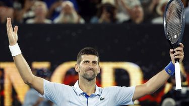 epa11093269 Novak Djokovic of Serbia reacts after match point against Adrian Mannarino of France during the Men's 4th round match at the Australian Open tennis tournament in Melbourne, Australia, 21 January 2024.  EPA/MAST IRHAM