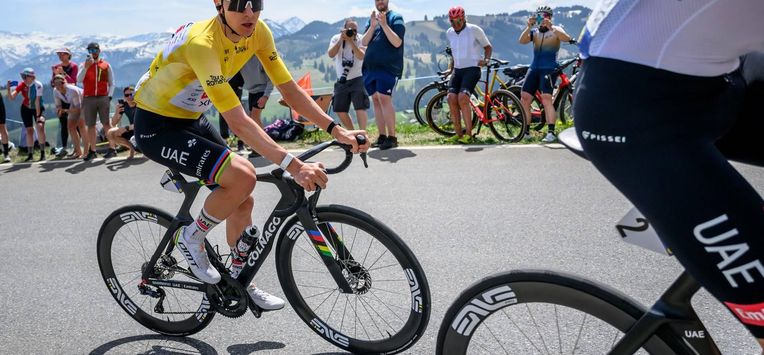 UAE Team Emirates-XRG's Slovenian rider Tadej Pogacar climbs the Jaunpass during the fourth stage of the Tour of Romandie UCI cycling World tour, 149.6 km from Broc and to Charmey, in Jaunpass, Switzerland, on May, 2, 2026. 
Fabrice COFFRINI / AFP