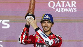 Third-placed Aprilia Racing's Spanish rider Jorge Martin celebrates on the podium at the end of the Qatar MotoGP Grand Prix at the Lusail International Circuit in Lusail, north of Doha, on April 13, 2025. 
Karim JAAFAR / AFP