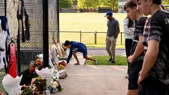 People lay flowers at the cricket nets in memory of promising 17-year-old Australian cricketer Ben Austin, who died in Melbourne on 30 October 2025, after being struck by a ball two days earlier. Austin was in the nets with a helmet on before a Twenty20 game in Melbourne on October 28 when he was hit in the neck while facing a ball-throwing device.
William WEST / AFP