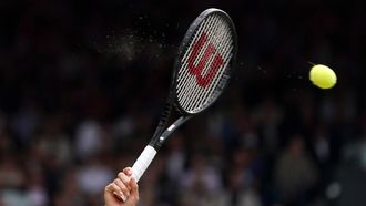 epa07716911 Roger Federer of Switzerland serves to Novak Djokovic of Serbia in the men's final of the Wimbledon Championships at the All England Lawn Tennis Club, in London, Britain, 14 July 2019. EPA/NIC BOTHMA EDITORIAL USE ONLY/NO COMMERCIAL SALES