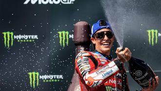 epa13054010 Spanish MotoGP rider Marc Marquez of Ducati Lenovo Team celebrates on podium after winning the the Motorcycling Grand Prix of the Czech Republic at the Masaryk Circuit in Brno, Czech Republic, 21 June 2026.  EPA/MARTIN DIVISEK