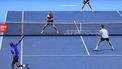 epa10984688 Rajeev Ram of USA and Joe Salisbury of Britain (bottom) in action during their doubles final match against Marcel Granollers of Spain and Horacio Zeballos of Argentina (top) at the Nitto ATP Finals tennis tournament in Turin, Italy, 19 November 2023.  EPA/Alessandro Di Marco