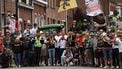 Spectators line the race route during the 1st stage of the 112th edition of the Tour de France cycling race, 184.9 km starting and finishing in Lille Metropole, northern France, on July 5, 2025. 
Anne-Christine POUJOULAT / AFP