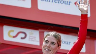 Team SD Worx - Protime's Dutch rider Demi Vollering celebrates her overall victory on the podium after winning the 8th stage of the 2024 La Vuelta Femenina cycling tour of Spain, an 89,5 km race from Madrid to Valdesqui ski resort, in Rascafria, on May 5, 2024. 
OSCAR DEL POZO / AFP