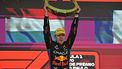 Red Bull Racing's Dutch driver Max Verstappen raises the trophy at the podium of the Formula One Sao Paulo Grand Prix, at the Jose Carlos Pace racetrack, aka Interlagos, in Sao Paulo, Brazil, on November 3, 2024. 
NELSON ALMEIDA / AFP