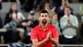 Serbia's Novak Djokovic waves to the crowd after losing his men's singles semi-final match against Italy's Jannik Sinner on day 13 of the French Open tennis tournament on Court Philippe-Chatrier at the Roland-Garros Complex in Paris on June 6, 2025. 
Dimitar DILKOFF / AFP