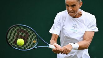 Netherlands' Arantxa Rus returns against Greece's Maria Sakkari during their women's singles second round tennis match on the third day of the 2024 Wimbledon Championships at The All England Lawn Tennis and Croquet Club in Wimbledon, southwest London, on July 3, 2024. 
Ben Stansall / AFP