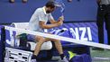 Russia's Daniil Medvedev breaks his racket after losing his men's singles first round tennis match against France’s Benjamin Bonzi on day one of the US Open tennis tournament at the USTA Billie Jean King National Tennis Center in New York City, on August 24, 2025. 
CHARLY TRIBALLEAU / AFP