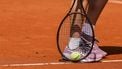 epa12116705 Ons Jabeur from Tunisia picks up a tennis ball during a training session for the French Open tennis tournament at Roland Garros in Paris, France, 19 May 2025. The 2025 French Open will be held from 25 May to 08 June 2025.  EPA/Teresa Suarez